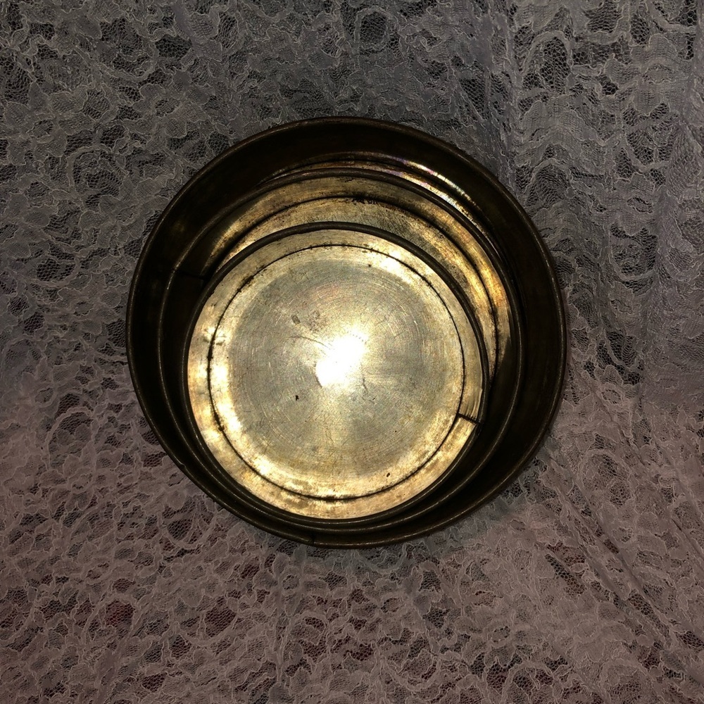 Three round vintage fruitcake/ wedding cake baking tins with removable bottoms.